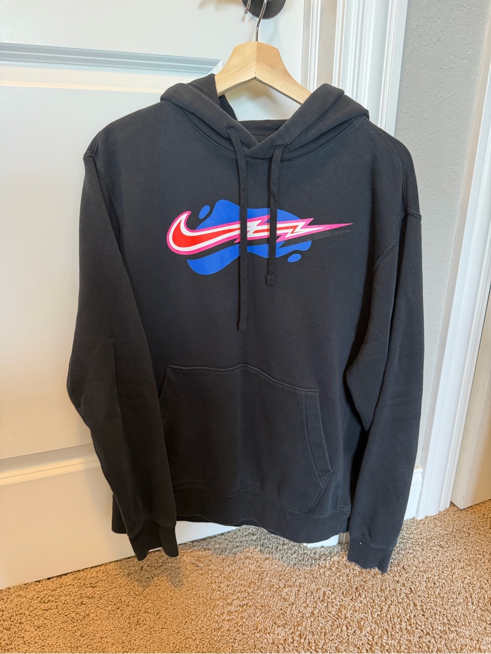Nike Black Hoodie with Blue and Pink Swoosh Graphic